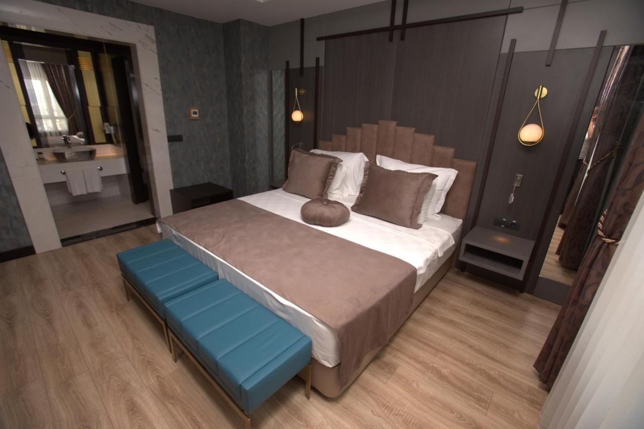 The Green Park Gaziantep Bagian luar foto A bedroom at the hotel