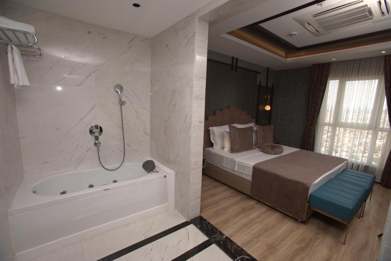 The Green Park Gaziantep Bagian luar foto A bathroom in a hotel room